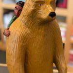 Tom Nussbaum, "Bear with Boy" sculpture