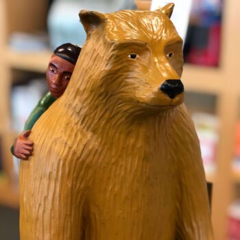 Tom Nussbaum, "Bear with Boy" Tom Nussbaum's "Bear with Boy" sculpture